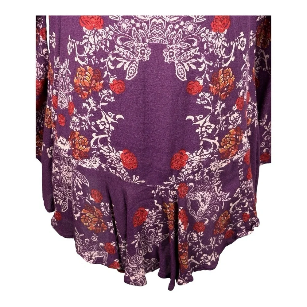 Free People Smooth Talker Purple Floral Open Back Long Sleeved Ruffled Tunic Top